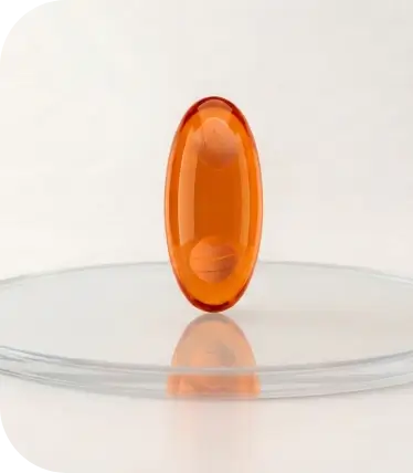 Orange softgel capsule